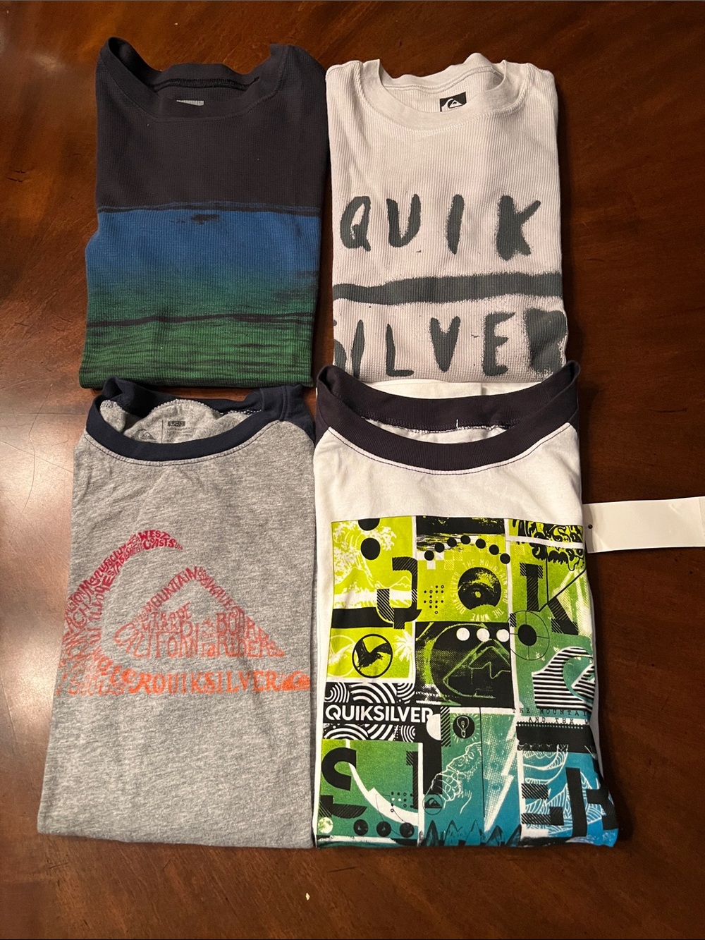 Bundle of 4 Quiksilver  Boys grafic long sleeve t-shirts